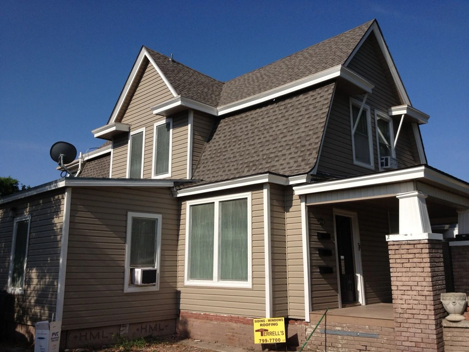 Home exterior after window and siding updates